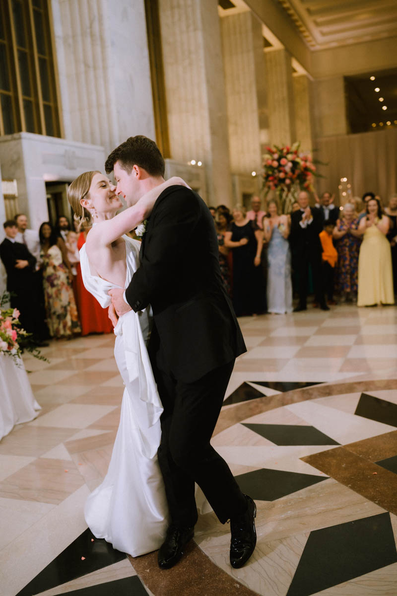 Bride and groom dancing together during their wedding reception