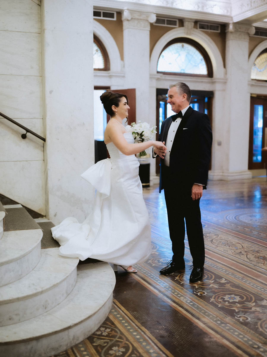Bride and her dad getting ready to leave for wedding ceremony