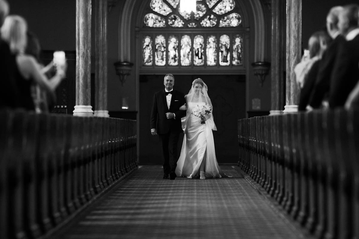 Bride walking down the aisle at St. Michael’s Church for her Chicago wedding ceremony