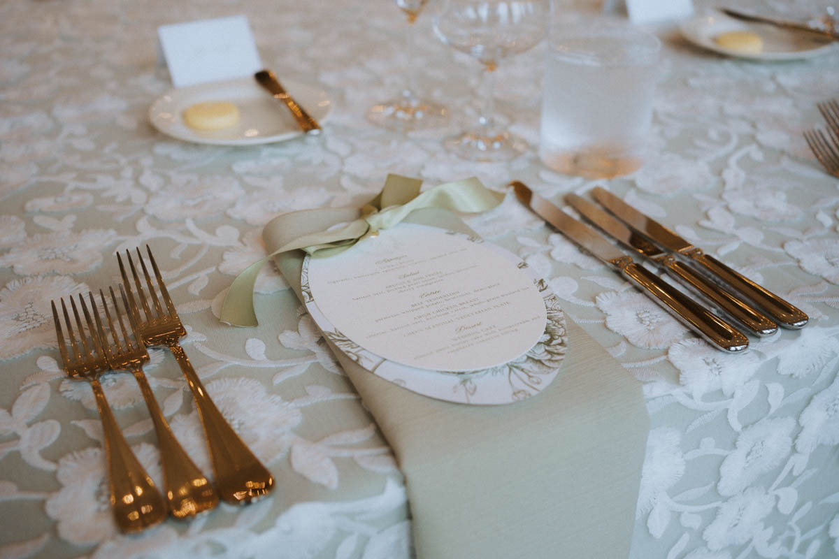 Wedding reception place settings and floral details at the Chicago Athletic Association Hotel