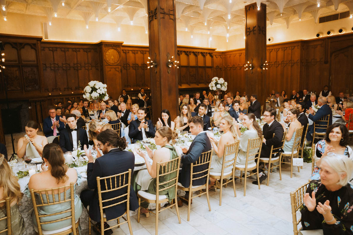 Wedding guests seated at tables during a reception at the Chicago Athletic Association Hotel