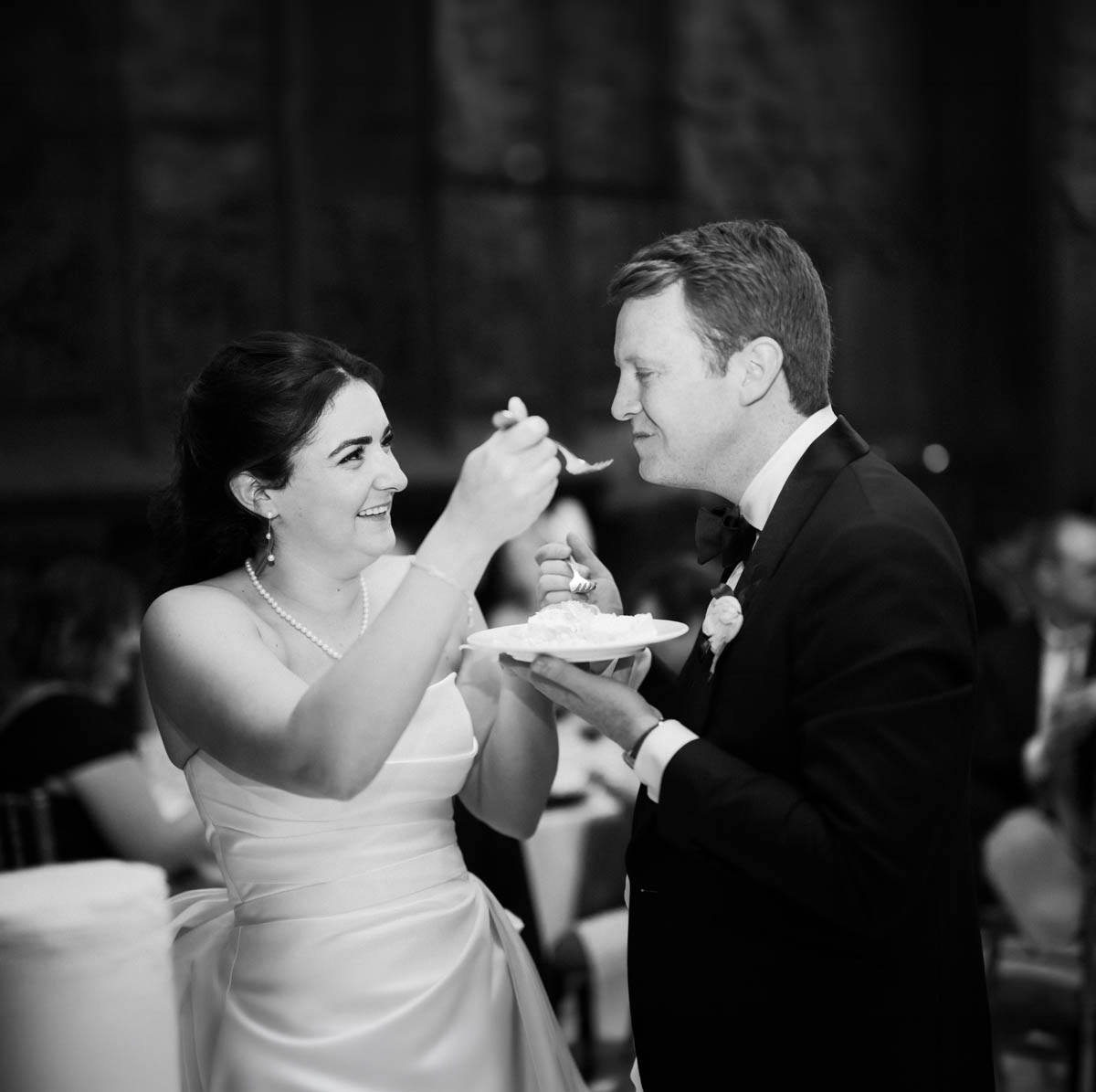 Bride and groom cutting their cake