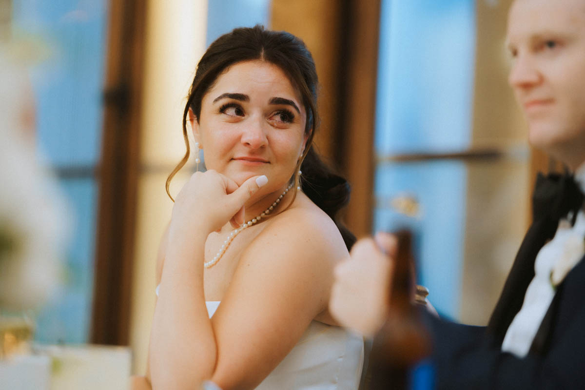 Bride looking emotional during her Chicago Athletic Association Hotel wedding reception