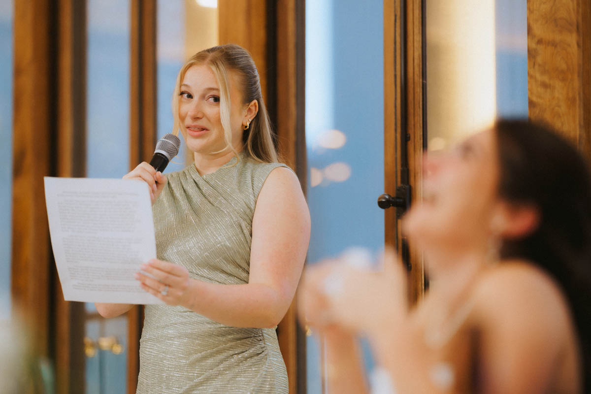 Maid of honor giving wedding toast