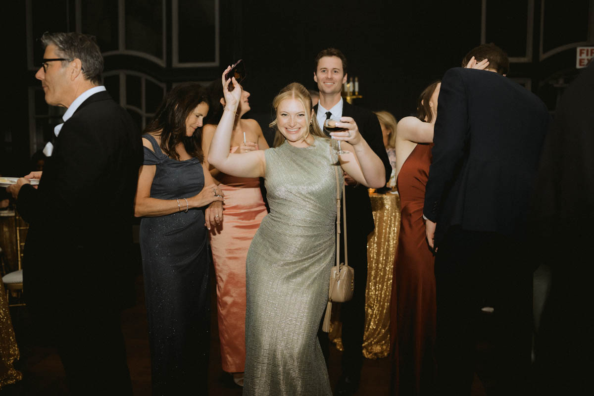 Maid or honor dancing during the wedding reception at the Chicago Athletic Association Hotel